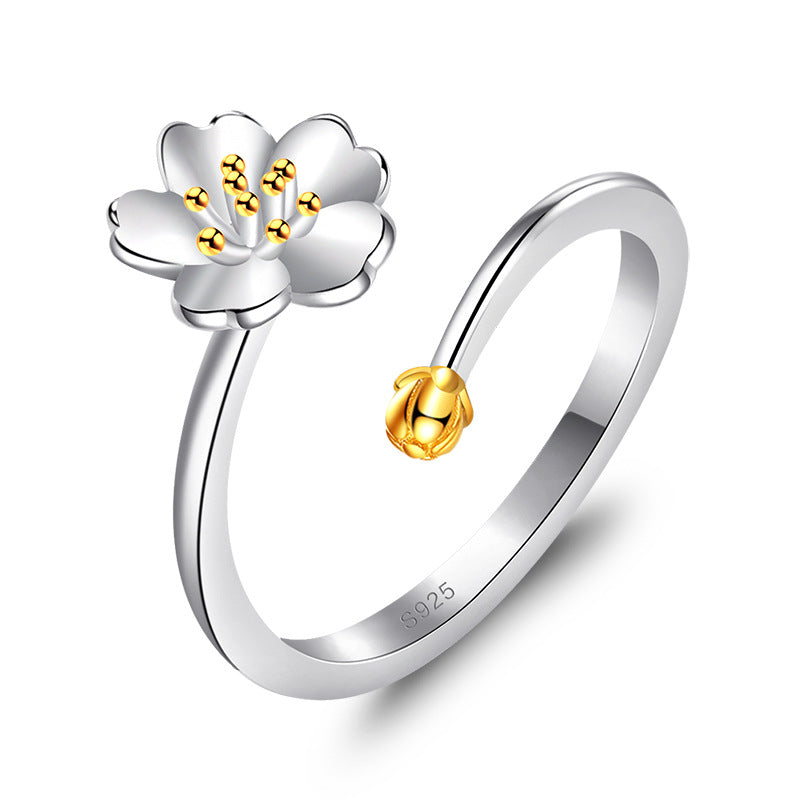 Damenring mit floralem Design und feiner Goldverzierung Shop Nory