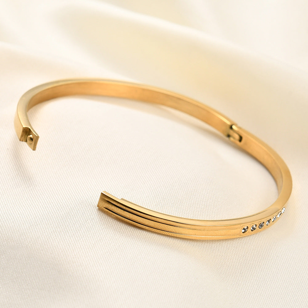 Damen Armreif aus Edelstahl mit filigranem Zirkonia-Besatz Shop Nory