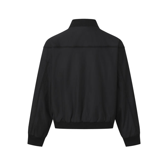 Unisex Kurz geschnittener Boxy‑Blouson mit hohem Rippkragen, verdeckter Knopfleiste und Elastikbund Shop Nory