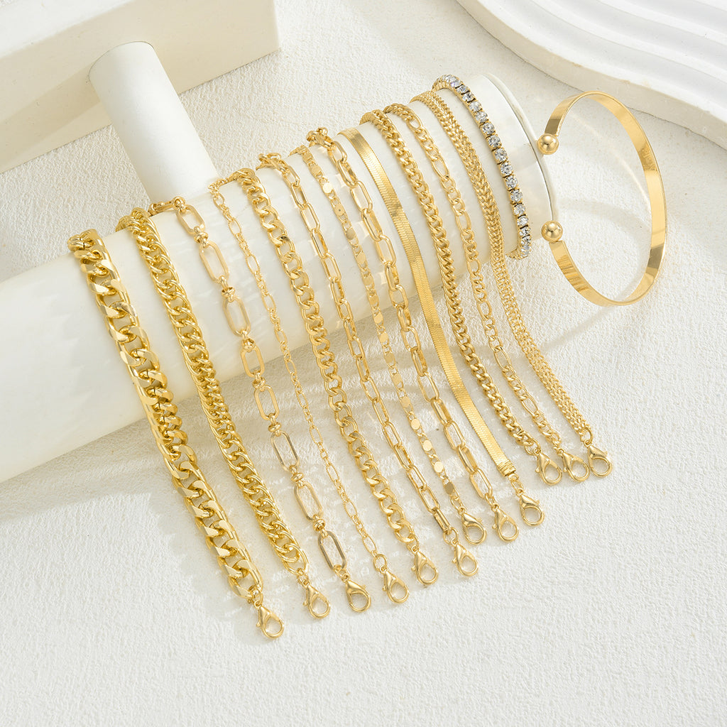 Damen Armband-Set mit eleganten Goldankern und funkelnden Kristallen Shop Nory