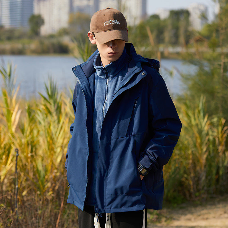 Damen zweilagige wasserabweisende Outdoorjacke mit Kapuze, Taillenregulierung und Kontrastbesätzen Shop Nory
