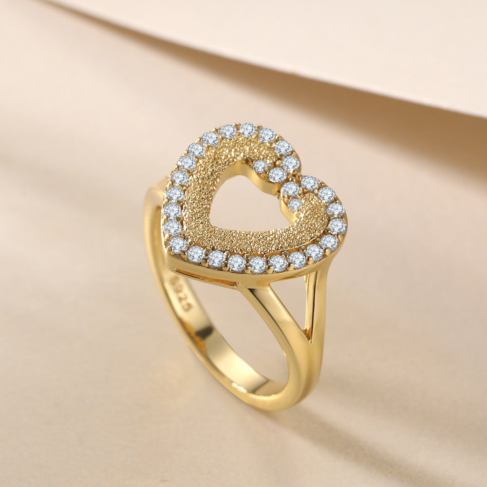 Damen Herz-Ring mit funkelnden Zirkonia und goldener Fassung Shop Nory