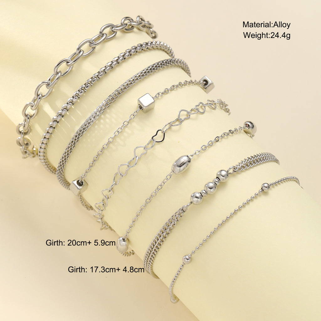 Damen Armband-Set mit feinen, geschmackvollen Ketten und eleganten Anhängern Shop Nory