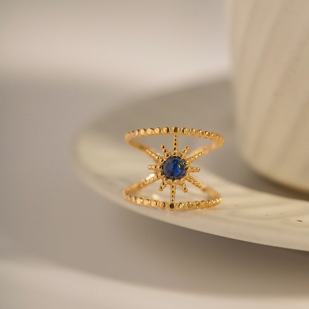 Damen Offener Ring mit filigranem Sonnenmotiv und hypnotisierenden Edelsteinen Shop Nory