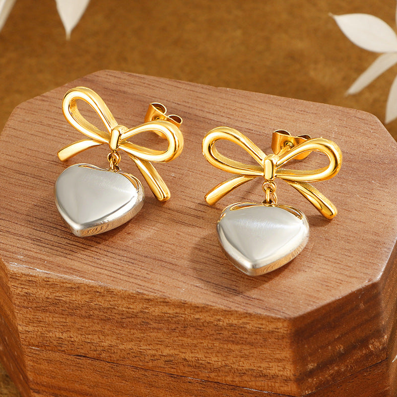 Damen elegante Ohrringe mit herzförmigem Anhänger und Schleifendesign Shop Nory