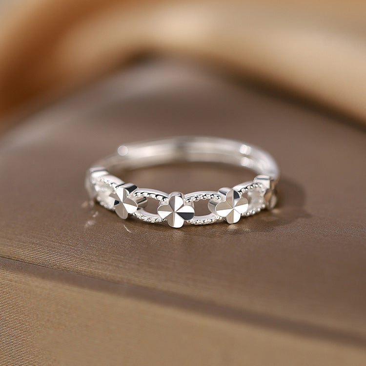 Damen Zierlicher Ring mit floralem Design und funkelnden Akzenten Shop Nory