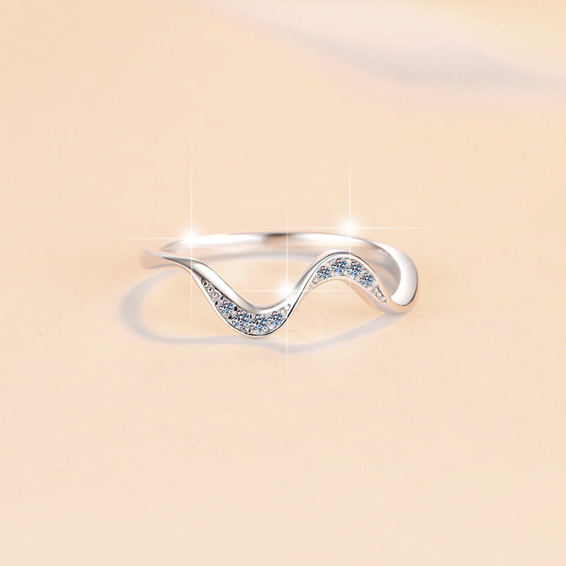 Damen geschwungener Zirkonia Ring mit filigranem Design Shop Nory