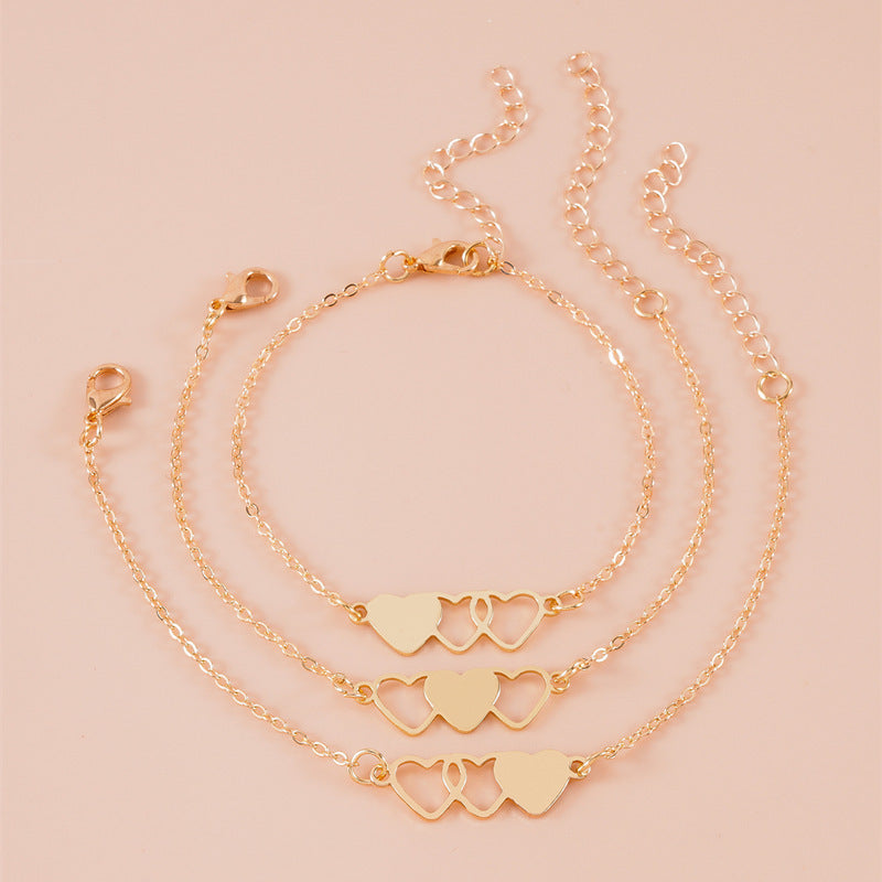 Damen Fußkettchen mit verspielten Herzmotiven und filigraner Kettenstruktur Shop Nory