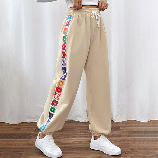 Damen Locker sitzende Jogginghose mit Gummibund, Tunnelzug und bunten Seitenstreifen Shop Nory
