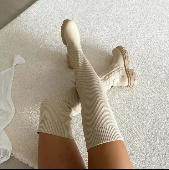 Damen kniehohe Stiefel mit auffälliger Sohle