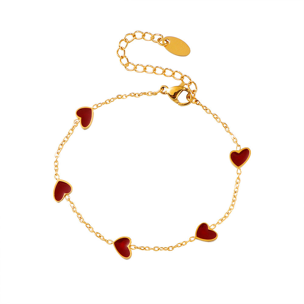 Damen Armband mit herzförmigen Anhängern Shop Nory