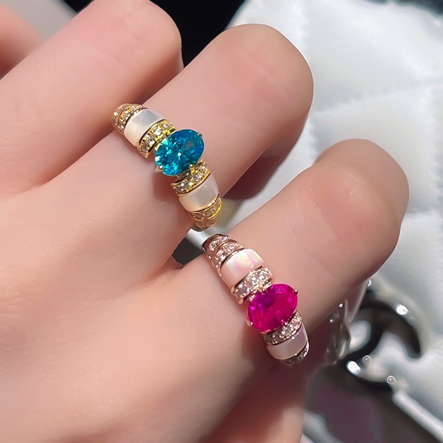 Damenring mit funkelndem Zirkonia und elegantem Perlmuttbesatz Shop Nory