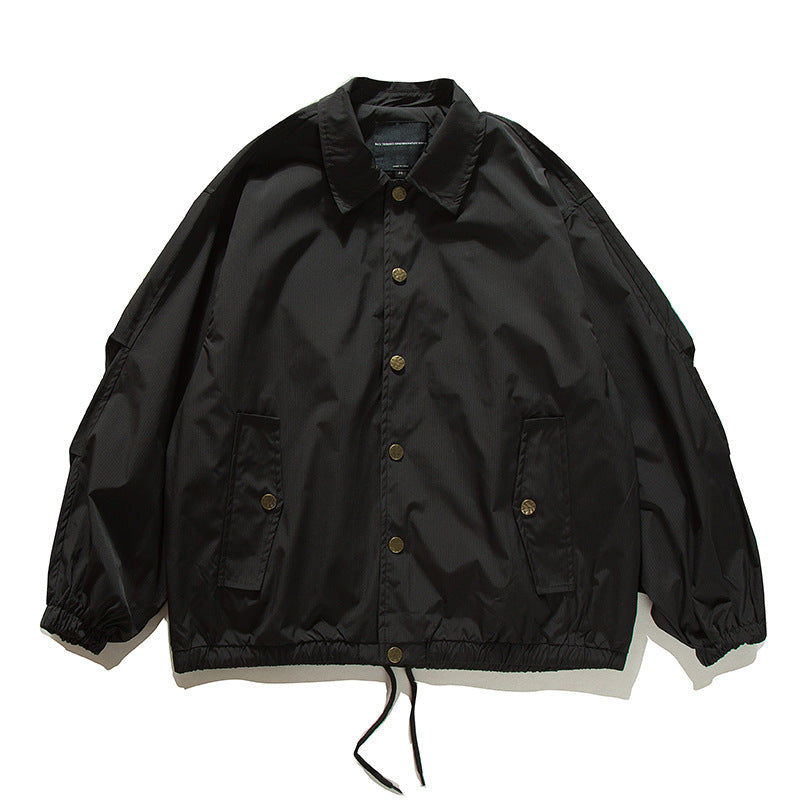 Unisex Boxy-Übergangsjacke im Bomberstil mit Tunnelzugsaum und Druckknopfleiste Shop Nory
