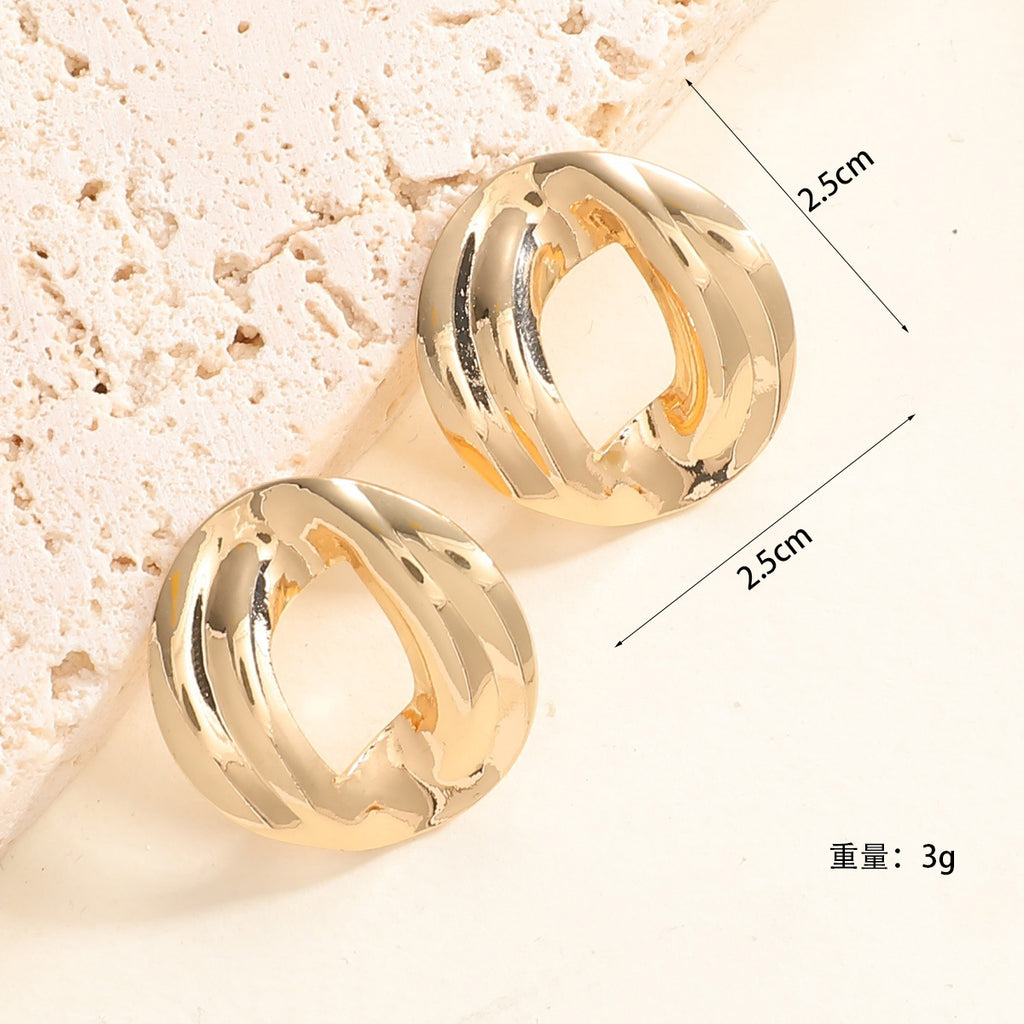 Damen Ohrringe mit modernem, skulpturalem Design Shop Nory