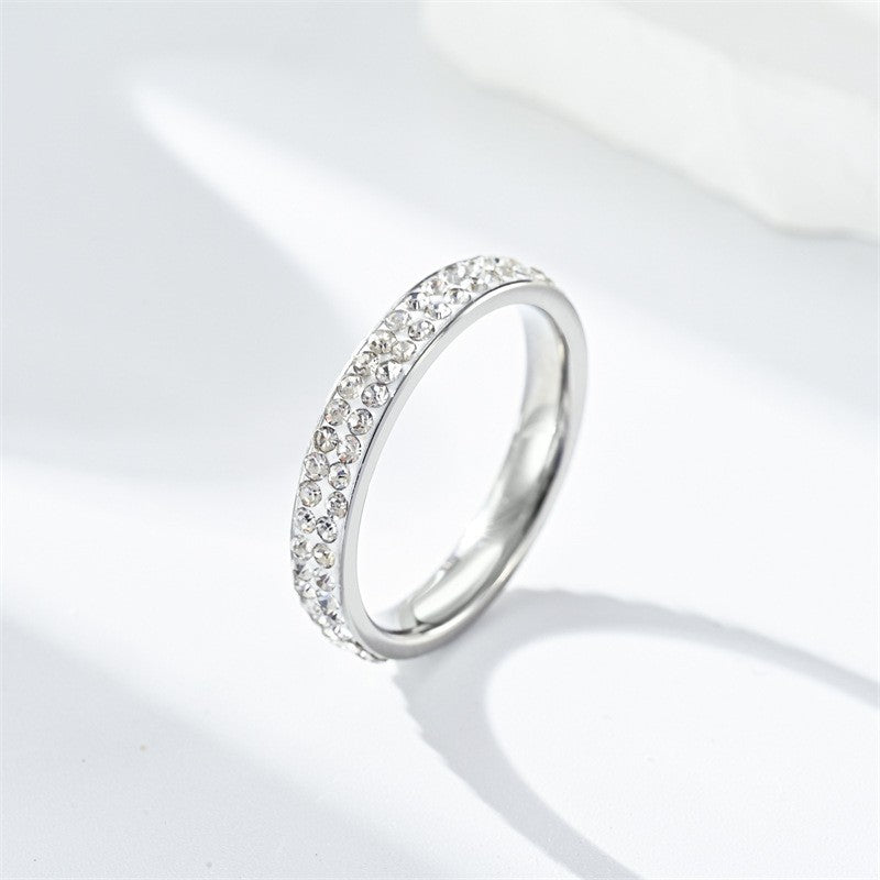 Damen Ring mit funkelndem Zirkonia-Besatz und eleganter Hochglanzoberfläche Shop Nory