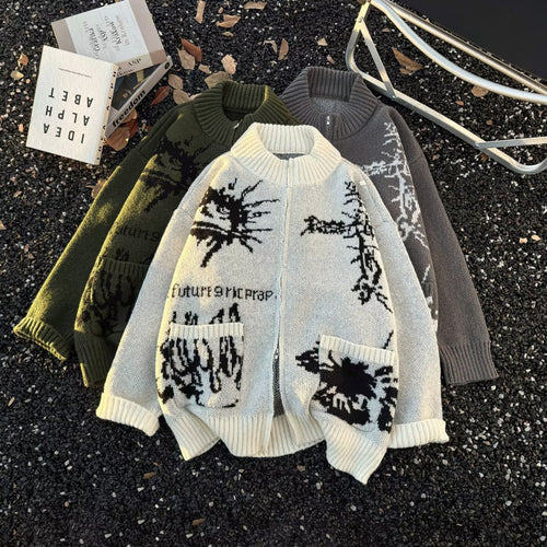 Unisex Grobgestrickte Zip‑Strickjacke mit hohem Rippenkragen, Jacquardmuster und aufgesetzten Taschen Shop Nory