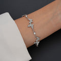 Damenarmband mit funkelnden Schmetterlingen Shop Nory