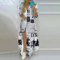 Damen Maxikleid mit Aufdruck im Zeitungslayout und seitlichem Schlitz