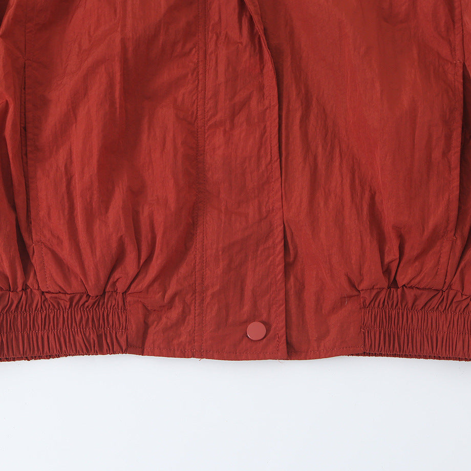 Damen Leichte Cropped Bomberjacke mit Stehkragen, elastischem Saum und Druckknopfleiste Shop Nory