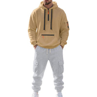 Khaki-Oberteil mit hellgrauer Hose