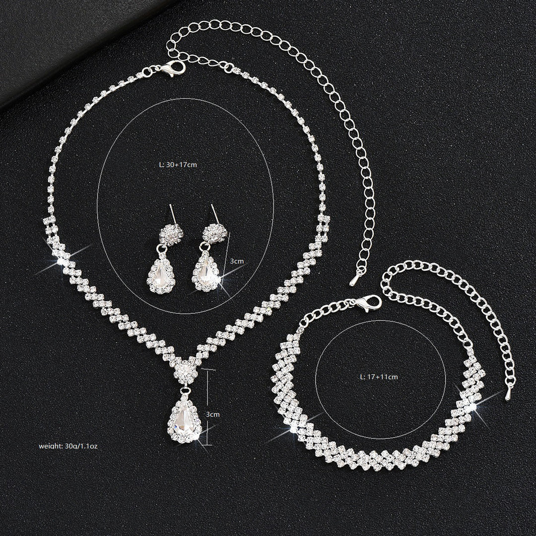 Tropfenpendant und passendes Tropfohrschmuckset für Braut mit kubischem Zirkonia-Halo