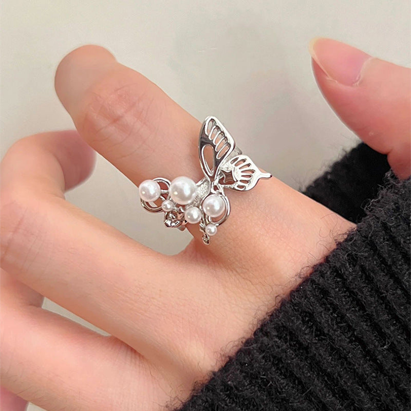 Damen eleganter Ring mit Schmetterlingsdesign und Perlen Shop Nory