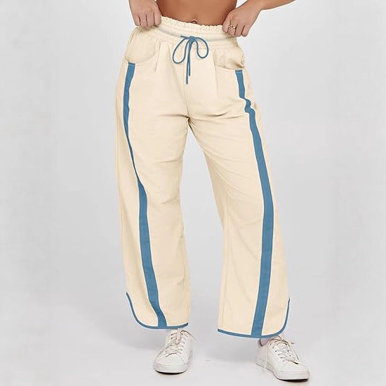 Damen nan relaxte Trackpants mit seitlichem Kontraststreifen, elastischem Smokbund und Eingrifftaschen Shop Nory