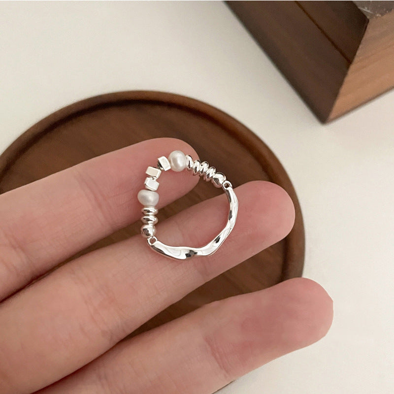 Damen Ring mit kunstvollem Design und edlen Perlenakzenten Shop Nory
