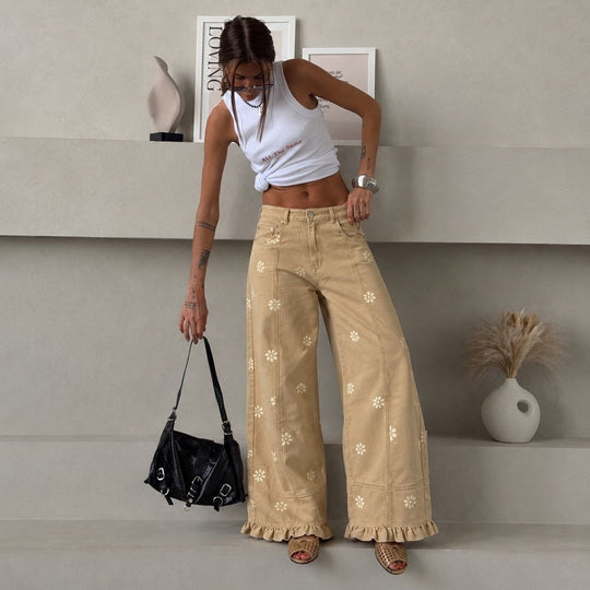 Damen weite Denimhose mit Gänseblümchen-Print, hohem Bund und Rüschenabschluss Shop Nory