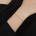 Damen zartes Perlenarmband mit goldfarbener Gliederkette Shop Nory