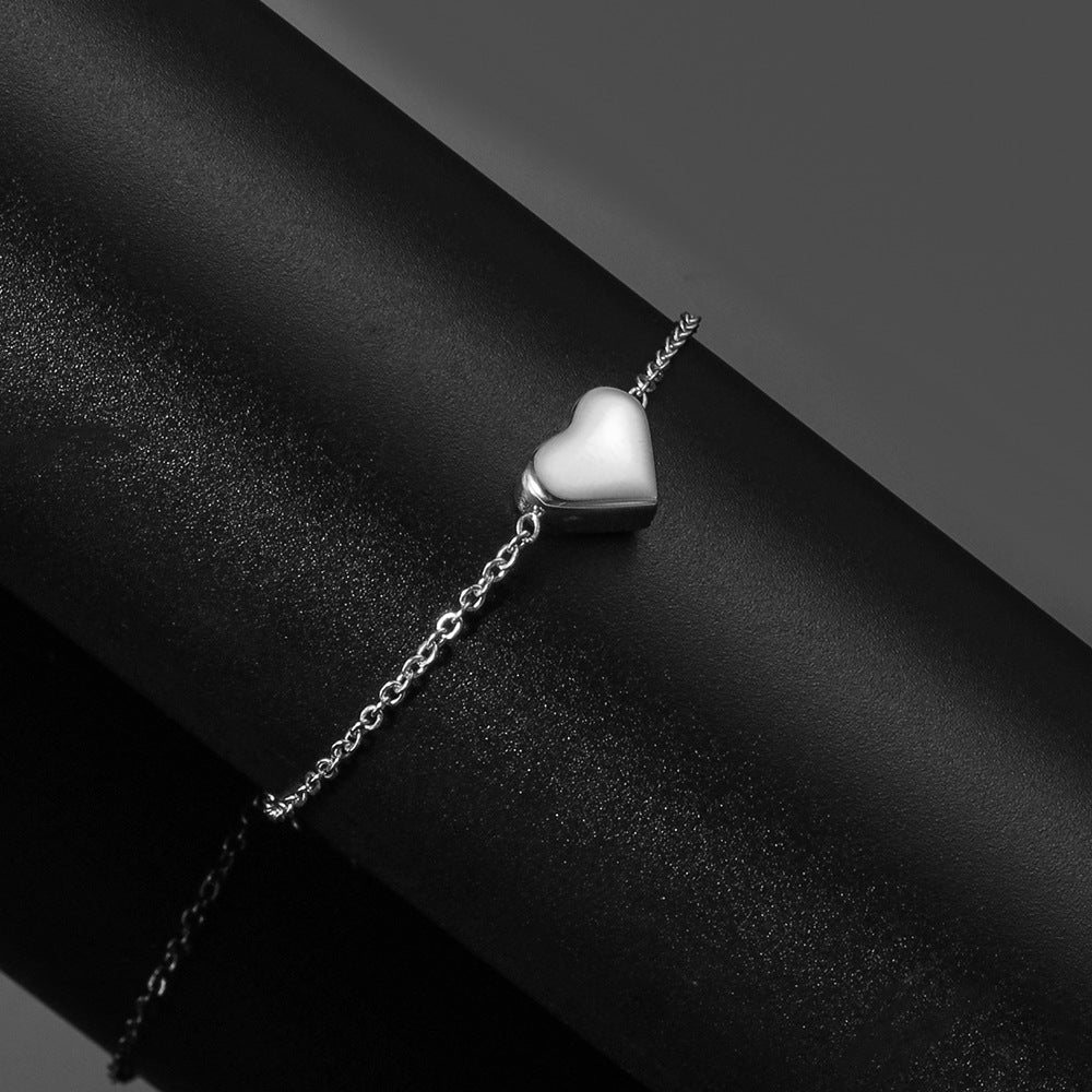 Damen Armband mit herzförmigem Anhänger und filigranem Design Shop Nory