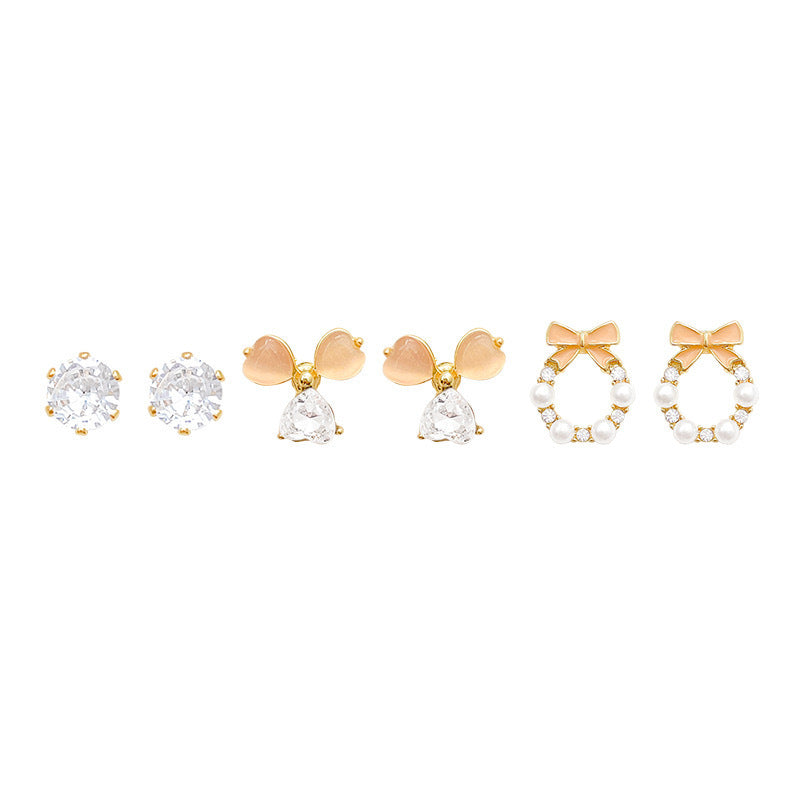 Damen Ohrstecker mit verspieltem Schleifen-Design und funkelnden Zirkonia Shop Nory
