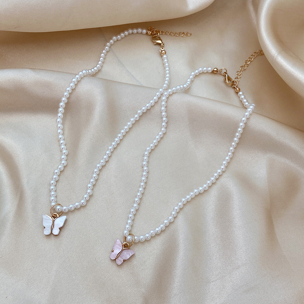 Damen Halskette mit elegantem Schmetterlingsanhänger aus Perlen Shop Nory