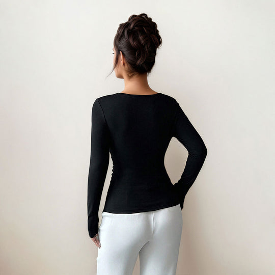 Damen figurbetontes Langarmshirt mit asymmetrischem Ausschnitt und dekorativer Brosche Shop Nory