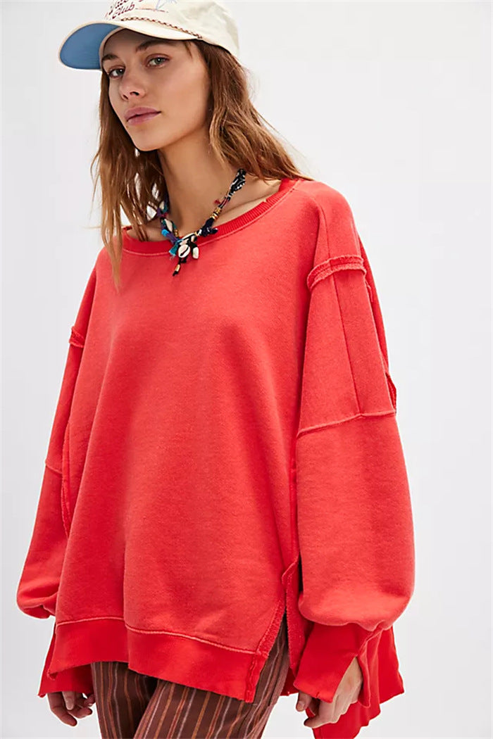 Damen oversized Sweatshirt mit Ballonärmeln, offenen Saumnähten und seitlichen Schlitzen Shop Nory