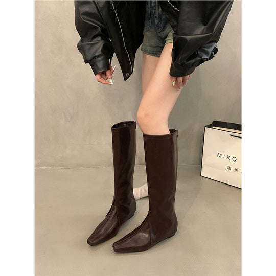 Damen Kniehohe schmal geschnittene Schlupf‑Stiefel mit quadratischer Zehenpartie Shop Nory