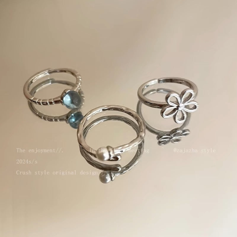 Damen Ring-Set mit filigranen Blütenmotiven und elegantem Edelsteindetail Shop Nory