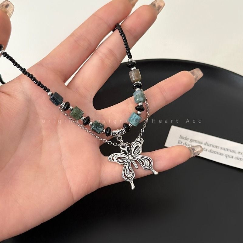 Damen Halskette mit kunstvollem Schmetterlingsanhänger und natürlichen Edelsteinen Shop Nory