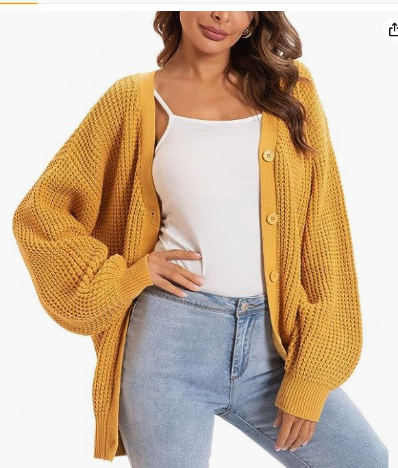 Damen nan Oversize Strickcardigan mit Ballonärmeln und großzügiger Knopfleiste Shop Nory