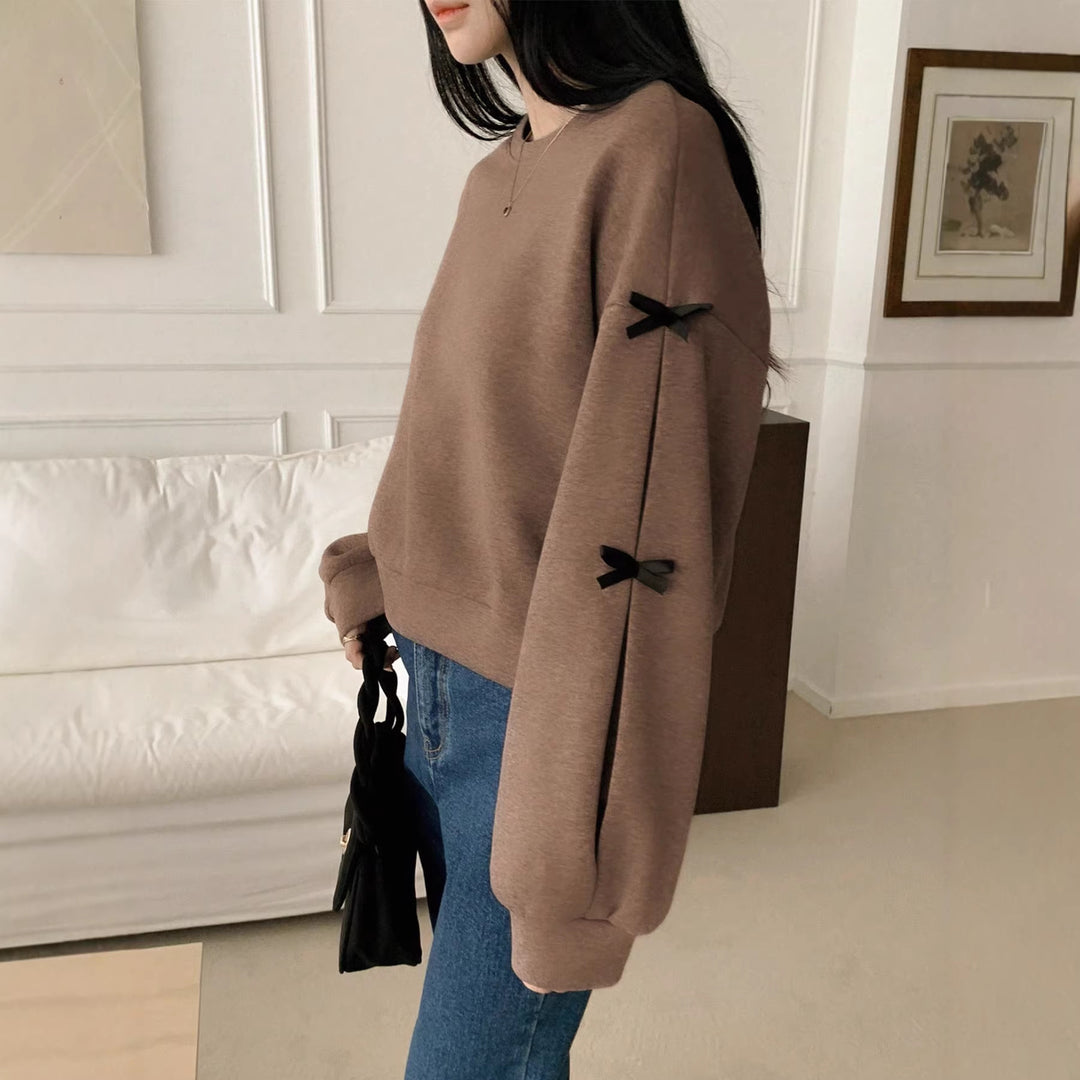 Damen Oversize‑Sweatshirt mit dekorativen Schleifenärmeln und Rundhalsausschnitt Shop Nory