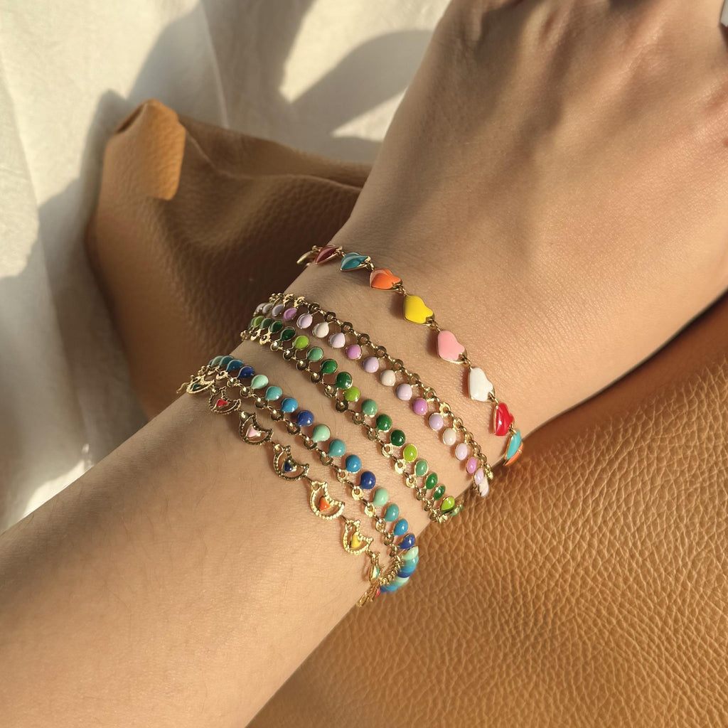 Damen Armband aus Edelstahl mit bunten Herz-Elementen und feiner Goldbeschichtung Shop Nory