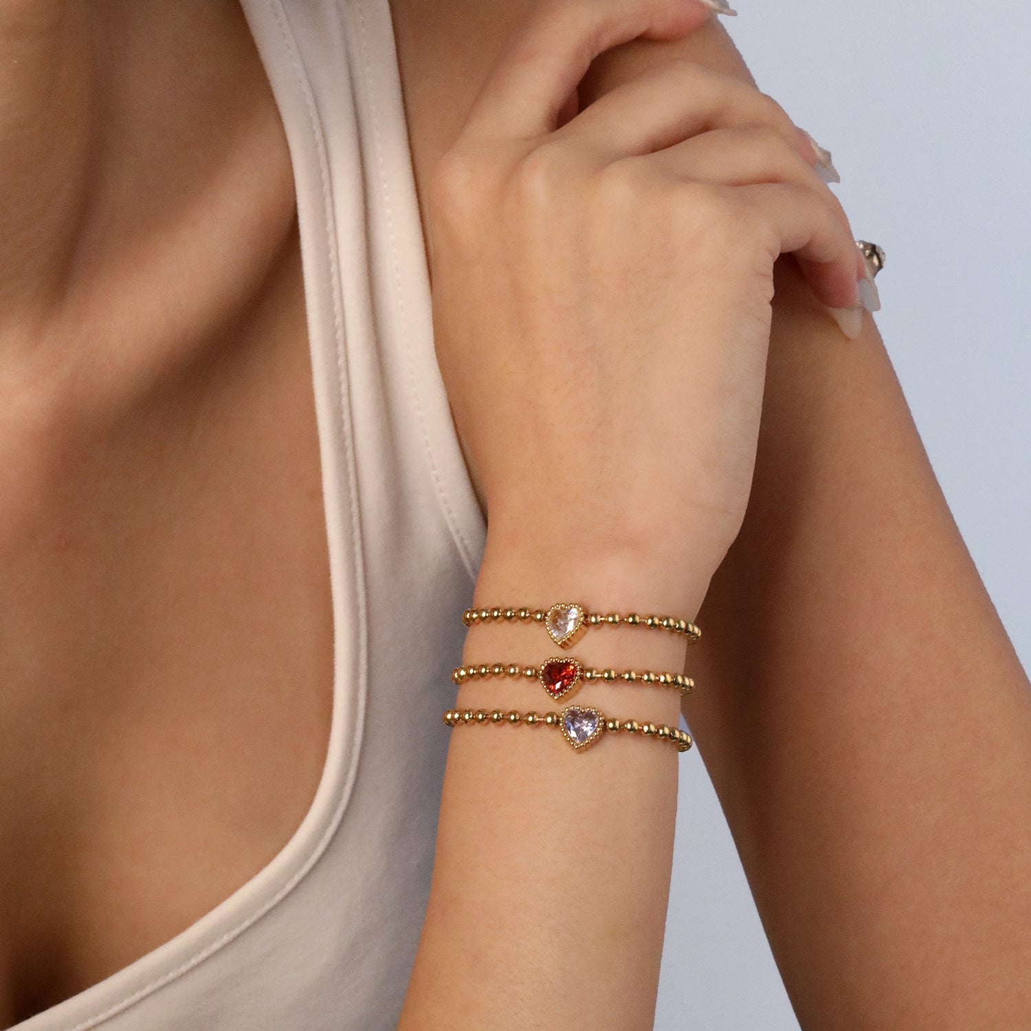 Damen Armband mit herzförmigem Kristallanhänger und eleganter Gliederkette Shop Nory