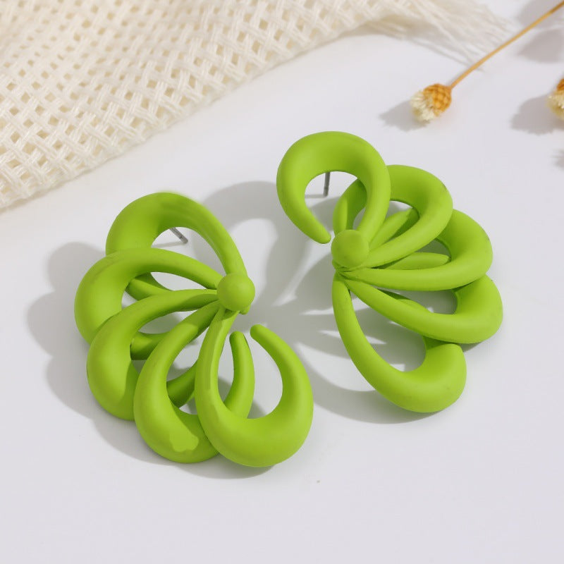 Damen Ohrstecker im künstlerischen Spiralmuster Shop Nory