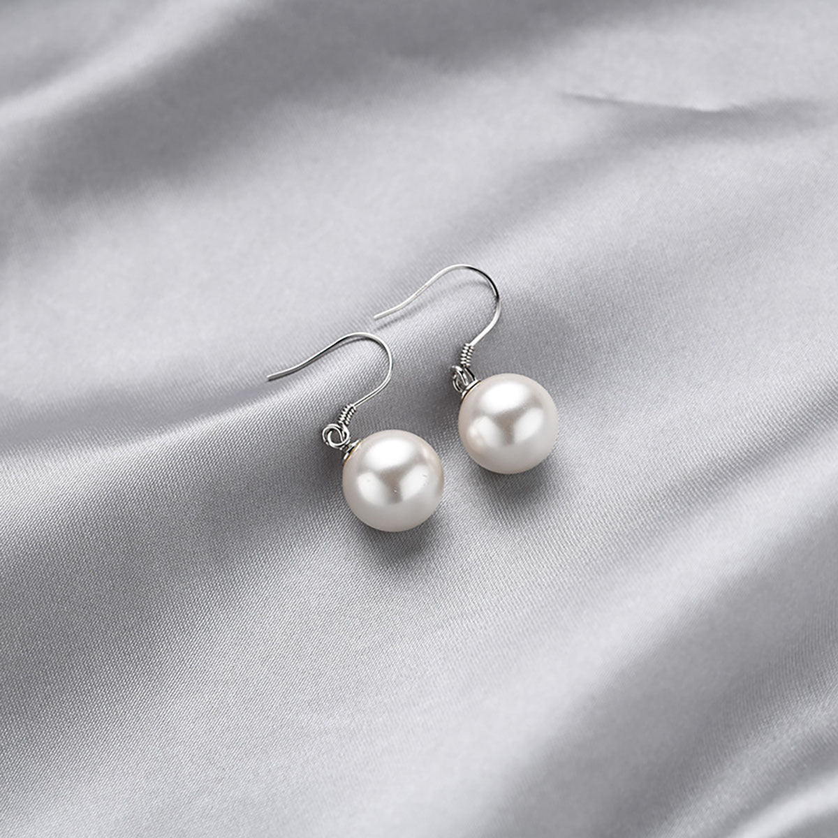 Damen Ohrhänger mit eleganten Perlen und feinem Silber-Design Shop Nory