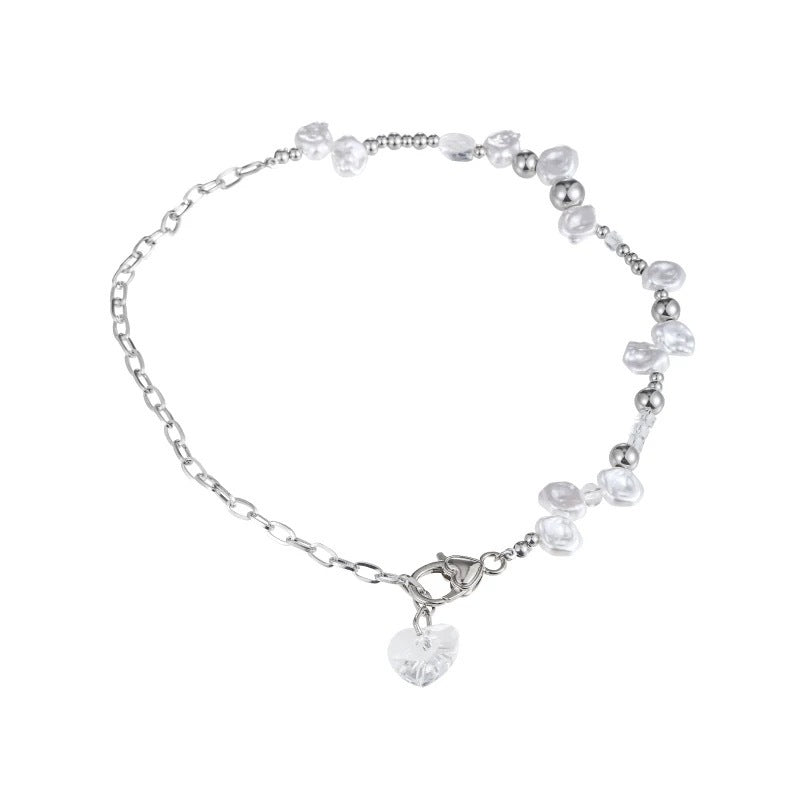 Damen Kette mit eleganten Perlen-Details und funkelndem Herzanhänger Shop Nory
