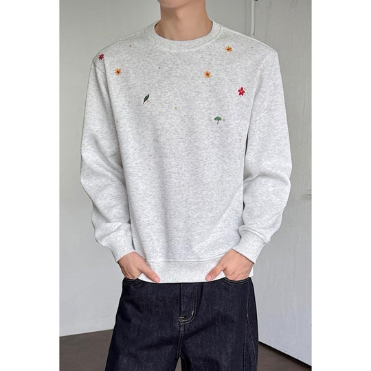 Herren Rundhals-Sweatshirt mit minimalistischer Blumenstickerei und cleanem Schnitt Shop Nory