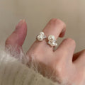 Damenring mit eleganten Perlen und funkelnden Zirkonia-Details Shop Nory