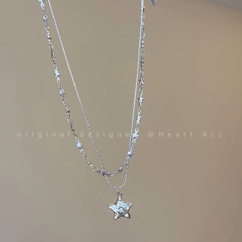 Damen Halskette mit funkelndem Sternanhänger und eleganter Gliederkette Shop Nory