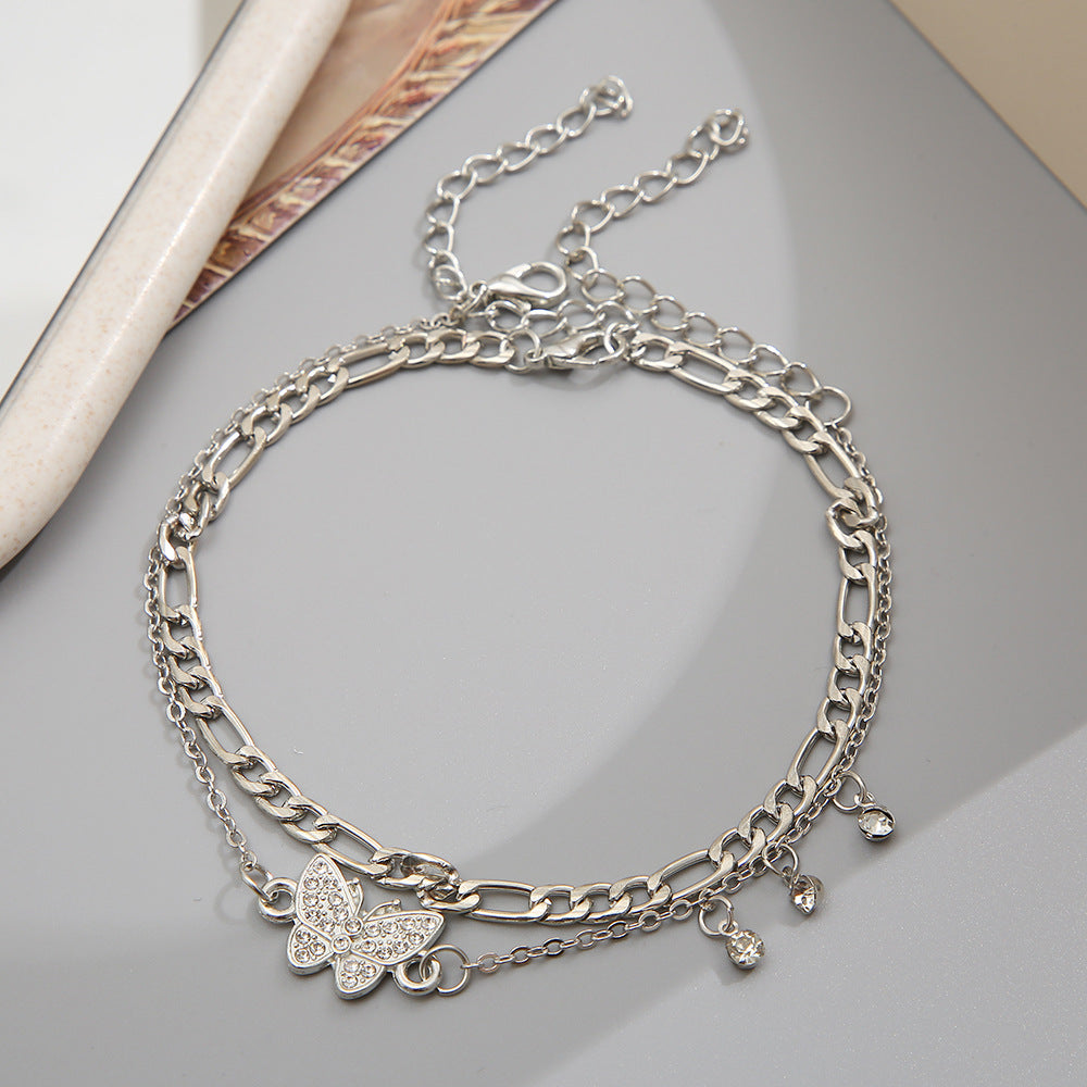Damen Fußkettchen mit funkelnden Ornamenten und floralen Details Shop Nory