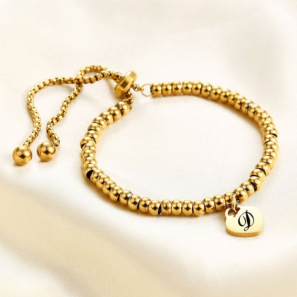 Damen Armband mit personalisierbarem Herzanhänger und flexibler Kettenstruktur Shop Nory